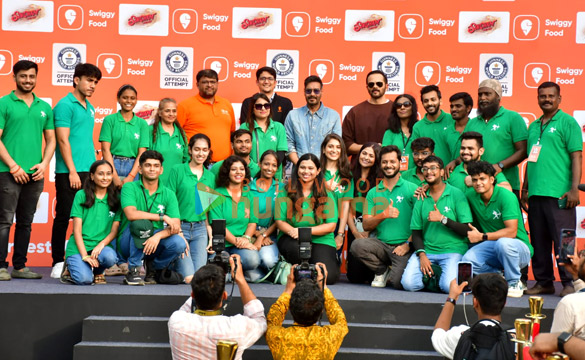 Photos: Ajay Devgn and Rohit Shetty attempt the Guinness World Record for the largest Vada Pav delivery at Airport High School & Junior College