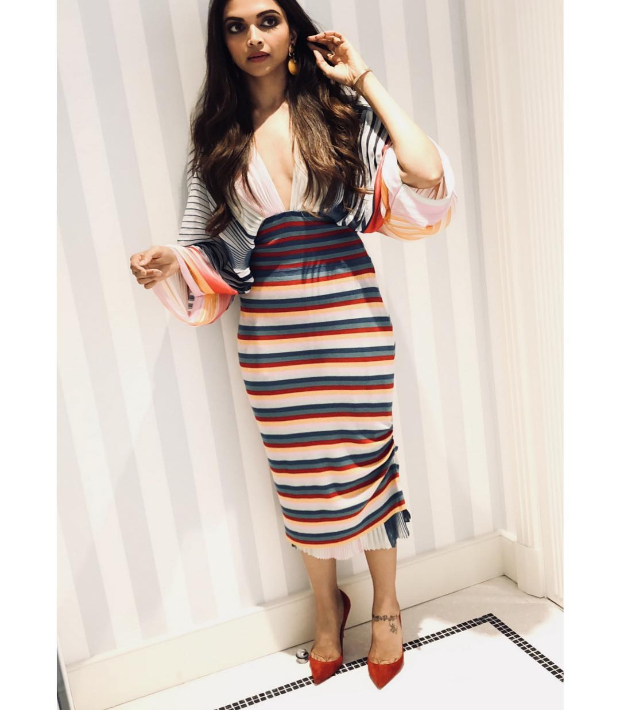 Cannes 2018 Red heels stripes and working that dangerous plunge