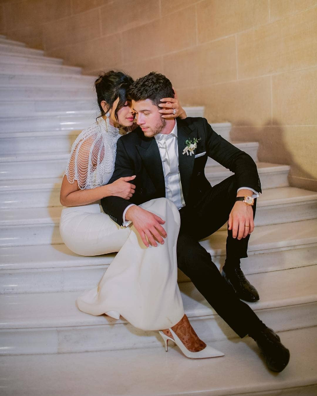 See Priyanka Chopra and Nick Jonas' High-Fashion Family Wedding Photo
