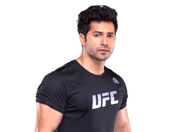 Watch: Varun Dhawan delights fans at the airport by gifting them roses