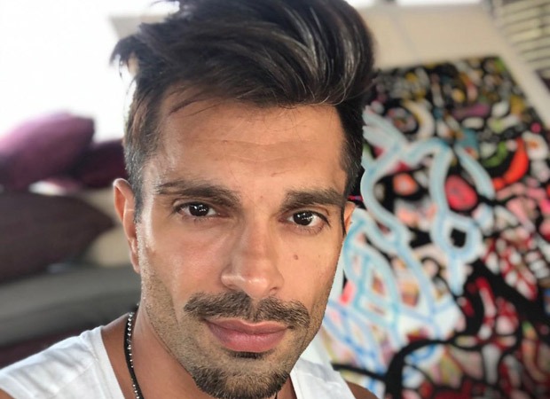 Karan Singh Grover puts soil to its maximum use, flaunts his physique as he works out shirtless