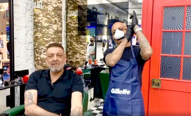 Sanjay Dutt is back in Mumbai from Dubai; gets a new hairdo for his next