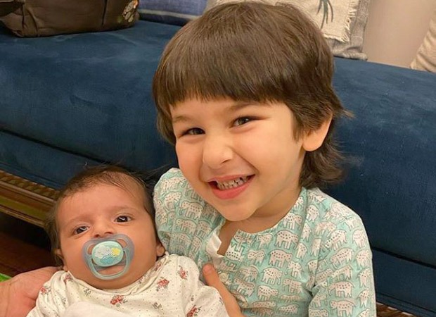 Taimur Ali Khan poses with a baby and he cannot stop smiling