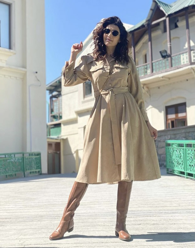Karishma Tanna opts for affordable trench dress and pairs it with knee high boots