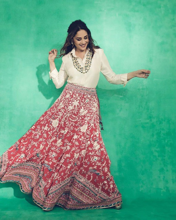 Madhuri Dixit gives modern contemporary feels by pairing a satin shirt with red lehenga skirt : Bollywood News - Bollywood Hungama