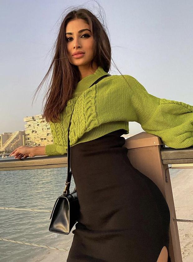 Mouni Roy's mini black dress with knitted sweater is effortless