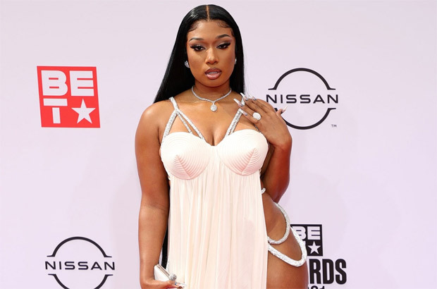 BET Awards 2021: Megan Thee Stallion boasts risky style in Gaultier white dress with extreme slits and metallic sandals on the red carpet with boyfriend Pardison Fontaine