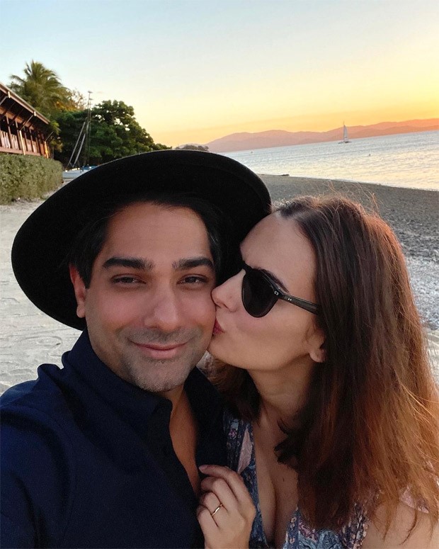 Evelyn Sharma gives a sweet kiss to her husband Tushaan Bhindi whilst on their honeymoon