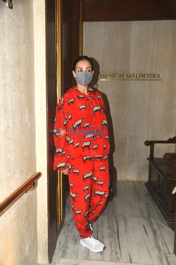 Kareena Kapoor Khan looks chic in black midi dress whereas Malaika Arora dons red cow print pajamas to Manish Malhotra's house