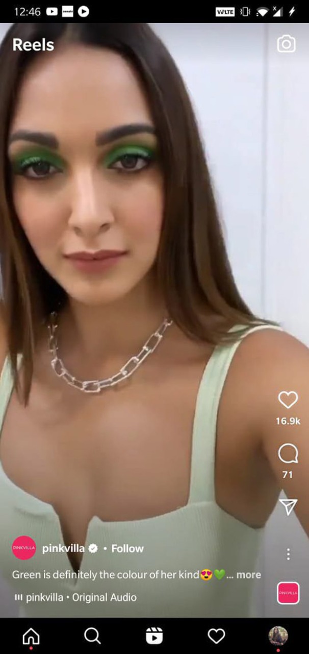 Kiara Advani echoes tropical weather flaunting her popping shimmery green eye makeup and off-white bodycon