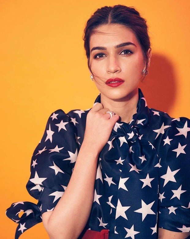 Kriti Sanon dons printed shirt and high waisted pants by Naeem Khan for Mimi promotions Kriti Sanon dons printed shirt and high waisted pants by Naeem Khan for Mimi promotions