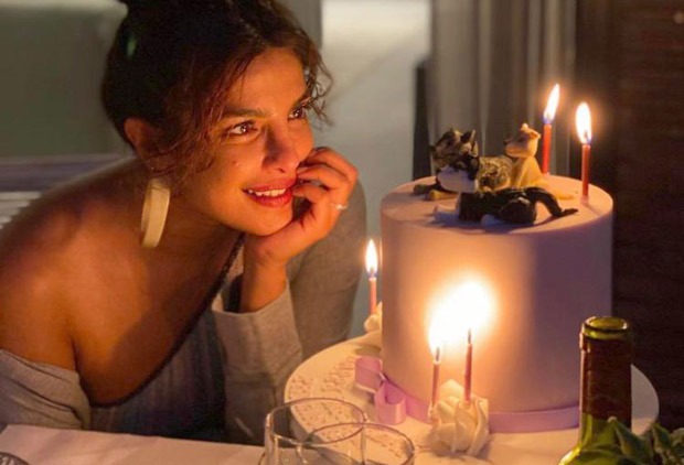 Priyanka Chopra enjoys sunny London weather in red plunging neckline swimsuit as Nick Jonas organises birthday party Priyanka Chopra enjoys sunny London weather in red plunging neckline swimsuit as Nick Jonas organises birthday party