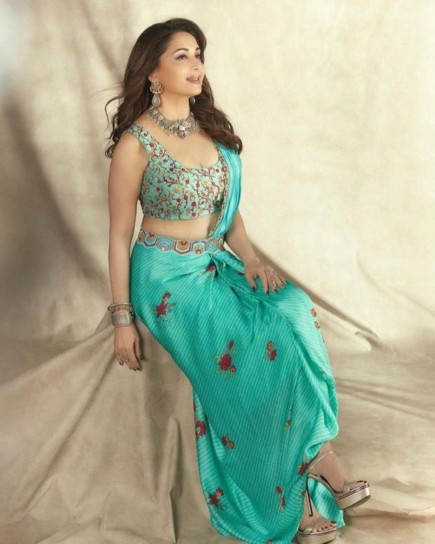 Madhuri Dixit Ki Sexy Picture Video - Madhuri Dixit looks gorgeous in a Turquoise pre-draped saree from Punit  Balana worth Rs.35,500 35500 : Bollywood News - Bollywood Hungama