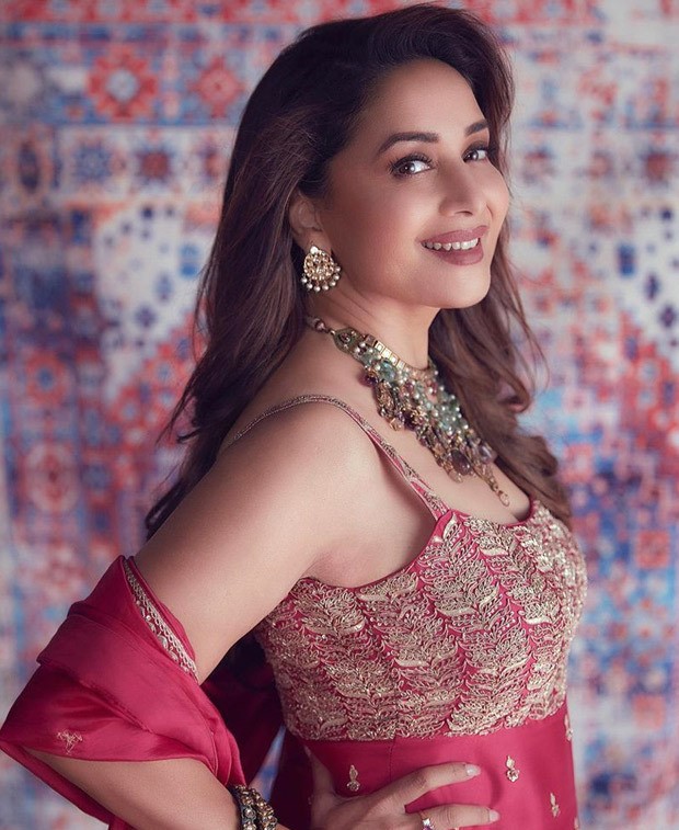 Madhuri Dixit looks gorgeous in a cherry red gharara from Punit Balana worth Rs. 75,000