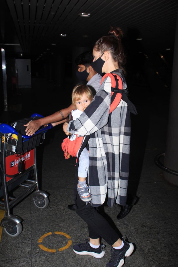 Kalki Koechlin sports a casual look as she arrives at the airport with her daughter Sappho
