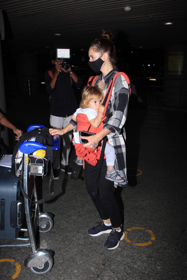 Kalki Koechlin sports a casual look as she arrives at the airport with her daughter Sappho