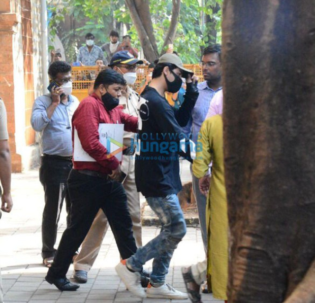 Shah Rukh Khan's son Aryan Khan clicked at NCB office amid drug bust controversy Shah Rukh Khan's son Aryan Khan clicked at NCB office amid drug bust controversy
