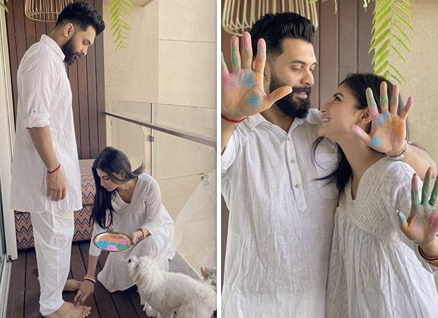 Mouni Roy touches husband Suraj Nambiar's feet as they celebrate first Holi as a married couple Mouni Roy touches husband Suraj Nambiar's feet as they celebrate first Holi as a married couple