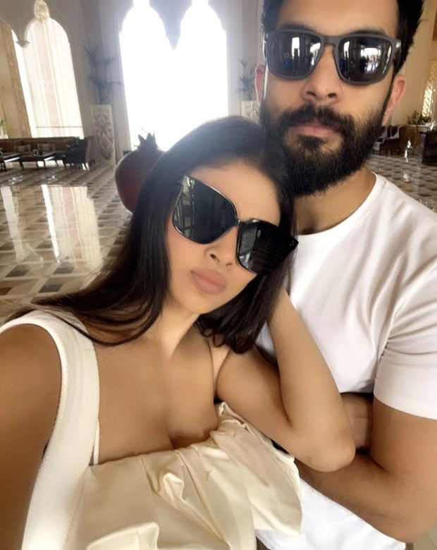 Mouni Roy looks smoking hot in white mini dress as she twins with her husband Suraj Nambiar in Doha