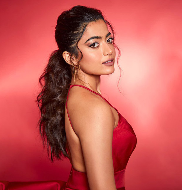 Rashmika Mandanna looks like a vision in red dress with plunging neckline and ruffled trail