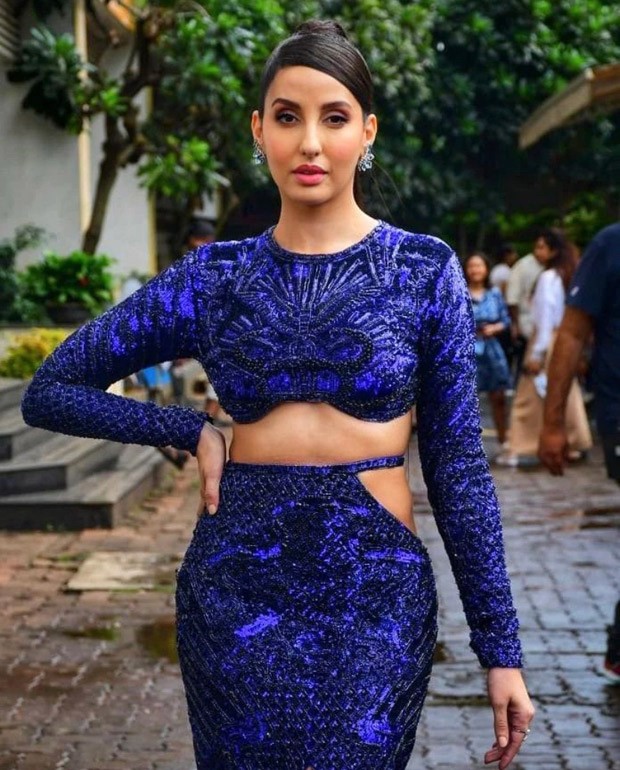 Nora Fatehi Looks Uber Chic In Purple Co-ord Set And Black Turtleneck,  Check Out The Diva's Sexy Pictures - News18