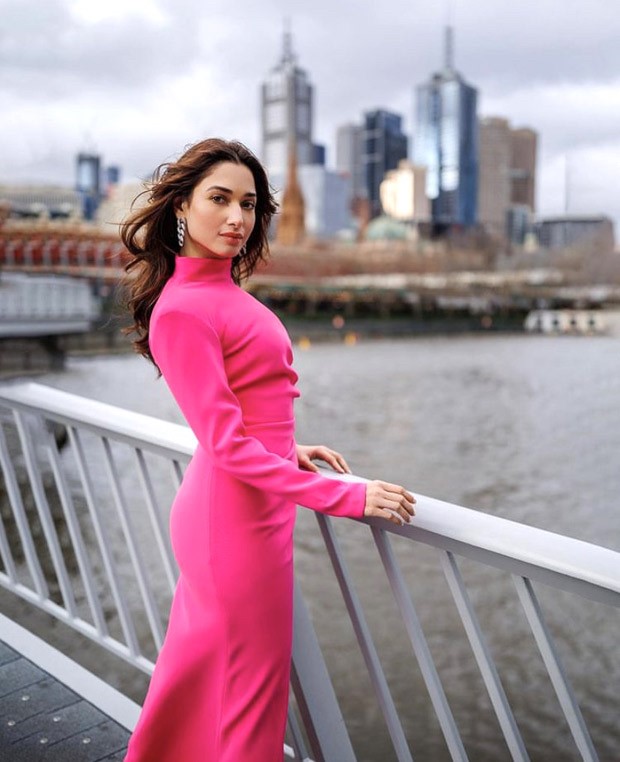tamanna bhatia pink dress A vision in pink and a masterclass in modern silhouette. Tamannaah Bhatia proving that a ruched gown and a bold gaze are the ultimate power pairing. #TamannaahBhatia #bollywood