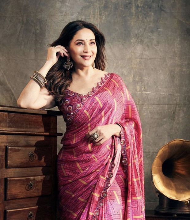 Madhuri Dixit makes hearts skip a beat in pink chiffon block