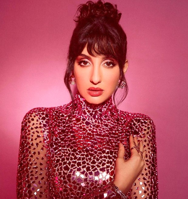 nora fatehi pink dress norafatehi is seen here in our bloom lehenga that features tints inspired by nature