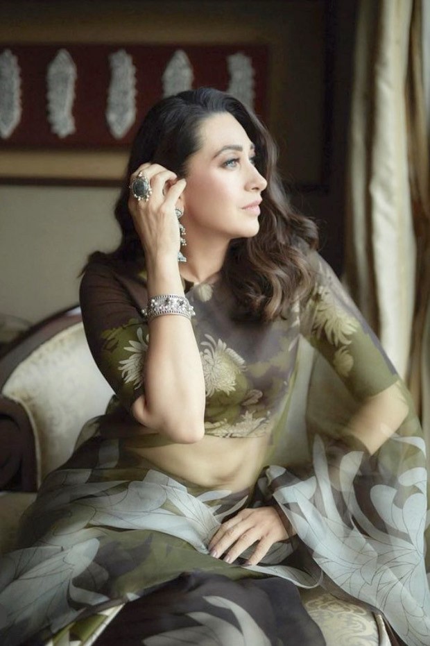 Karisma Kapoor’s floral olive-green saree worth Rs. 19K can serve as your wedding guest wardrobe inspiration
