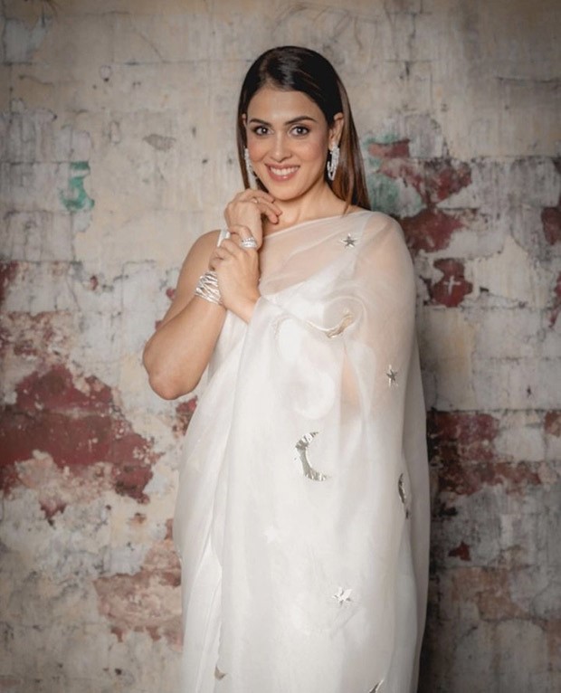 Genelia D'souza mesmerises in a kapardara sheer ivory saree for Rs. 26,000 for Ved promotions