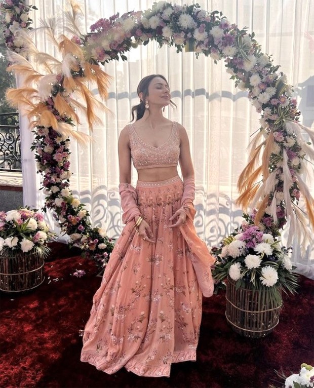 Rakul Preet Singh is relishing the winter sun and the wedding season sporting a peach lehenga with embroidery that cost Rs. 68K : Bollywood News - Bollywood Hungama