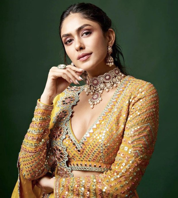 Mrunal Thakur conveys her fans wishes for Pongal and Makar Sankranti with a series of photographs wearing a yellow silk organza lehenga