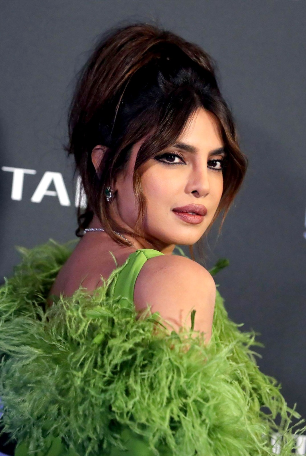 Priyanka Chopra goes for the drama in green feather-embellished Valentino gown with heels for Citadel premiere in Rome; Nick Jonas goes ‘damn’ 