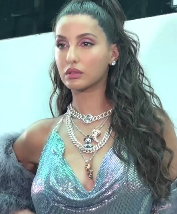 Nora Fatehi in a shiny chainmail top and inside out denim jeans is breaking  fashion boundaries : Bollywood News - Bollywood Hungama