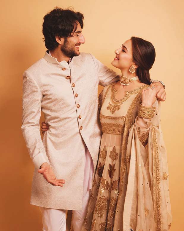 Sara Ali Khan embraces old world charm in Pakistani designer Iqbal Hussain’s ivory pishwas and silk crushed lehenga; Ibrahim Ali Khan complements her with regal Raghavendra Rathore bandhgala